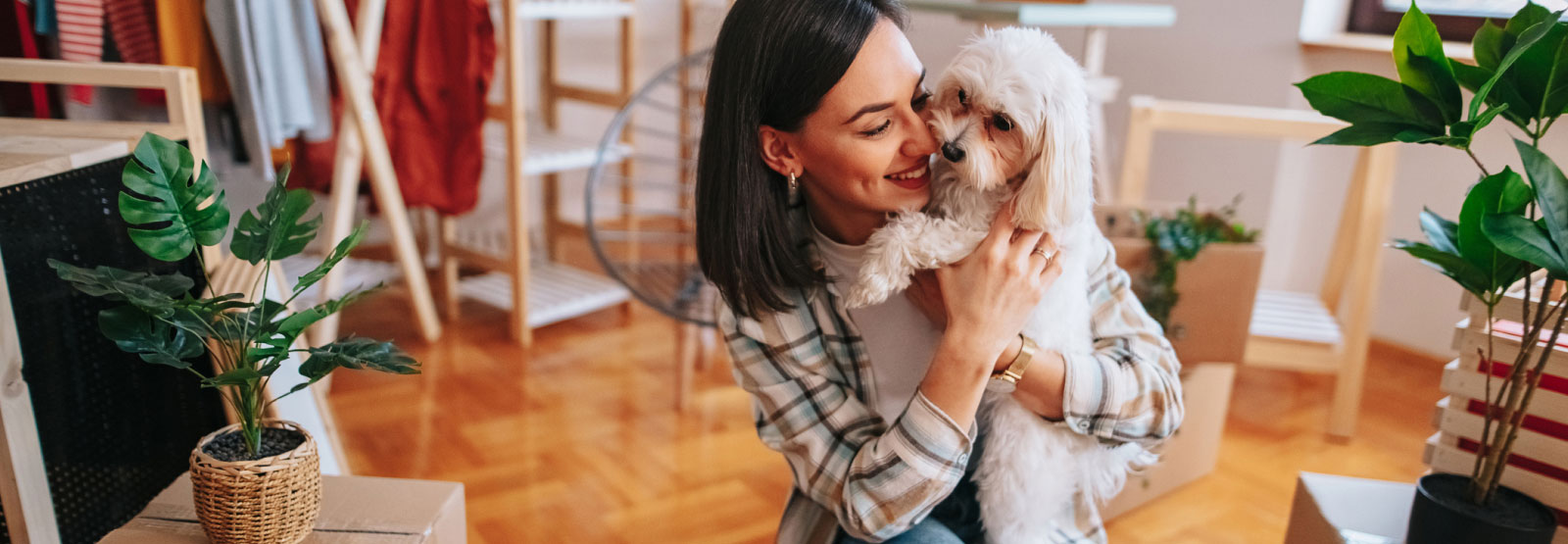 a woman hugging her dog