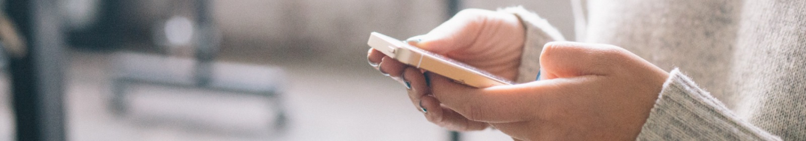 a person looking at their mobile phone